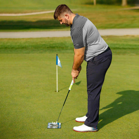 Golfer using 12 Inch Golf Putting Mirror Training Aid For Indoor Or Outdoor Practice That Helps You Align, Improve Swing Path, And Build Confidence, Right Or Left Handed, Game Changing Feedback On Every Green on grass