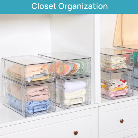 Four Pack Large Clear Stackable Storage Drawers With Smooth Pull Out Slides And Grippy Silicone Pads For Super Neat Closets That Keep Your Belongings Squared Away Daily with folded clothes inside.