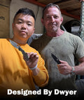 Two men holding knives in workshop, showcasing the Duane Dwyer Collaboration Folding Knife 3.54 Inch CPM S35VN Blade Titanium Alloy Handle