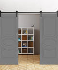 Modern Double Barn Door 84 By 96 Inches Painted Grey With 13 Ft Rail Track Set in a living room setting