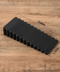 Rock Solid Black Rubber Wedge Shims For Furniture Leveling 3.66x1.57in anti-slip wedge pads on wood surface.