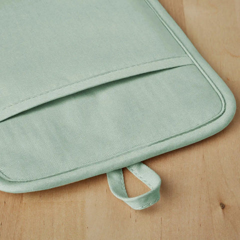 Back view of Ribbed Soft Silicone Pot Holders 2 Pack Set in Pistachio Green 7x9 Inches showing pocket and hanging loop.