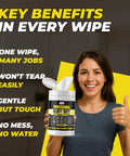 Smiling woman holding Heavy Duty Multi Purpose Wipes For Tools Hands Glass and Stainless Steel Pre Moistened Streak Free
