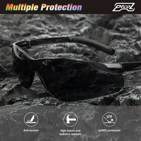 24 Pack Smoke Safety Glasses with Tinted Polycarbonate Lenses, ANSI Z87.1 Rated Eye Protection on rocky surface