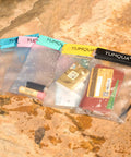 Clear Waterproof Dry Bags Set Of Three Pouches For Phone, Camera, Maps And Documents on rock background, frosted yellow PVC case
