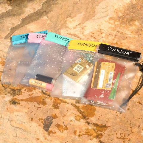 Clear Waterproof Dry Bags Set Of Three Pouches For Phone, Camera, Maps And Documents on rock background, frosted yellow PVC case