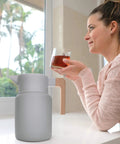 50 Oz Thermal Coffee Carafe Stainless Steel Insulated Dispenser Keeps Your Brew Hot Or Cold For Hours With Tea Infuser And Strainer Large One And A Half Liter Double Wall Vacuum Bottle Gray Finish Easy Pour on counter