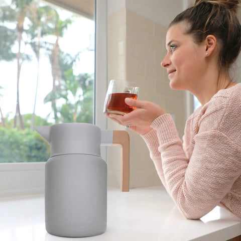 50 Oz Thermal Coffee Carafe Stainless Steel Insulated Dispenser Keeps Your Brew Hot Or Cold For Hours With Tea Infuser And Strainer Large One And A Half Liter Double Wall Vacuum Bottle Gray Finish Easy Pour on counter