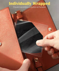 Person placing individually wrapped KN95 Face Mask 5-Ply Protective Respirator into a brown purse, bulk 30 pack available, black.