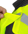 Close-up showing adjustable collar of Kickass High Visibility Safety Vest Featuring Rock Solid Five Point Breakaway System Top Shelf Reflective Dry Mesh For Tough Job Sites No Sweat Adjustable Fit Road Crews SM.