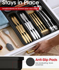 Expandable Silverware Drawer Organizer For Kitchen Storage And Organization Adjustable Utensil Tray For Forks Knives And Flatware Multipurpose Drawer Solution For Dishes Cosmetics Jewelry And More Grab And Go Space Saving Black Medium in kitchen drawer with knives and forks.