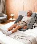 Cyanvine Electric Lifting Backrest For Bed With Remote Control, Adjustable Power Recliner Angles From 2 To 80 Degrees, No Install Needed, Perfect For Pregnancy Elderly And Patients With Handrail Fence, grey backrest in use by an elderly man on a bed.