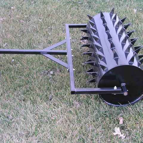 48 Inch Wide Drum Spike Aerator With Pin Style Hitch And Lawn Roller For Lawn, Garden, And Patio Care in black on grass