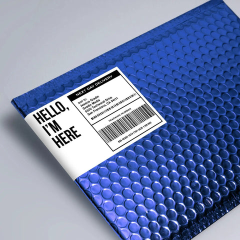 Kick Your Shipping Game With Smooth Operator Laser Compatible Labels Featuring Sure Feed Tech For Zero Jamming Hassles 3.5 X 5 Inches White 400 Count Ready To Roll Easy Peasy Mailing on a blue bubble mailer.