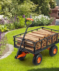 Heavy Duty Steel Garden Dump Cart That Hauls Big Loads With Eight Hundred Eighty Pound Capacity in a yard with wood logs loaded