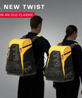 Two people with All In One Wet Dry Gym And Pool Backpacks in team colors, showcasing ergonomic straps and durable build.