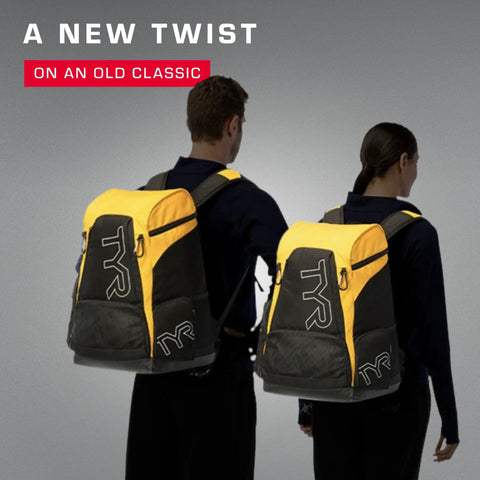 Two people with All In One Wet Dry Gym And Pool Backpacks in team colors, showcasing ergonomic straps and durable build.