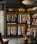 Kick Your Storage Game Up A Notch With This Heavy Duty Wood Corner Closet System Featuring Six Hanging Rods And Two Modular Towers To Build A Spacious L Shaped Freestanding Wardrobe In Sleek Black Finish, showcasing neatly organized clothing.