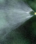Close-up of nozzle spraying water from Electric Plant Sprayer Battery Powered Wand Automatic Handheld Watering Sprayer Telescopic Reach