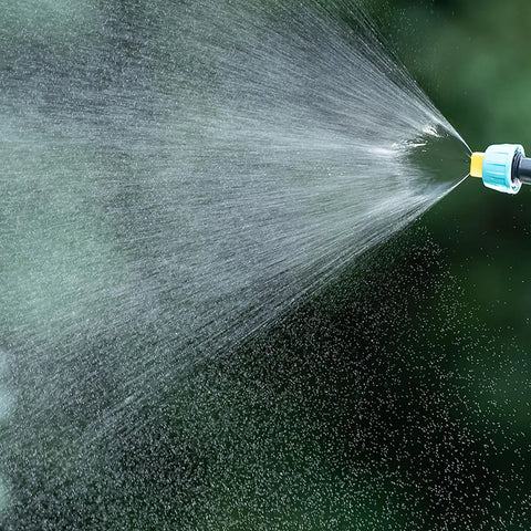 Close-up of nozzle spraying water from Electric Plant Sprayer Battery Powered Wand Automatic Handheld Watering Sprayer Telescopic Reach