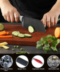 Crinkle cutter knife with stainless steel wave blade and gray ergonomic handle slicing cucumber on cutting board