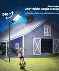Solar Powered Outdoor Street Light Dusk To Dawn With 3 Modes Motion Sensor And Remote Control illuminating a barnyard.