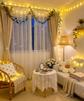 Room decorated with 100 LED Globe String Lights Indoor Outdoor 33ft Warm White With Remote Connectable Fairy Lights