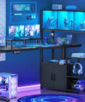 Full On Game Changer Electric Dual Motor L Shaped Standing Desk With Extra Storage Hutch One Touch Smooth Lift For Relaxed Posture Flow Perfectly Adjusted Height Range 28 To 45 Inches Anti Collision Safe Working Surface, modern workspace with dual monitors and RGB lighting.