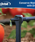 Close-up of Tomato Garden Drip Irrigation System Kit for 10 Plants with Push Connect Fittings watering tomato plant.