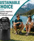 Grab And Go Portable Travel Washing Machine With Retractable Clothesline For Hotels Cruises And Camping Easy Manual Hand Wash Bag by a lake with campers.
