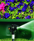 Sprinkler Overspray Guard For Lawns, Splash Shield For Underground Irrigation, Durable Plastic Guard in garden setting