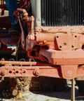 Close-up of tractor with 10 Piece Zinc Plated Lynch Pin Kit With Ring 8x45mm Shaft Locking Pins in use for secure connections.