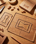 Pro Tier 3 Pack Bow Tie Inlay Router Template Kit with two clear acrylic templates on wood, ideal for butterfly key repairs.