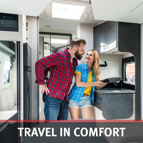 Couple enjoying time in RV kitchen with No Fuss Compact Wall Mount Rv Electric Heater Featuring Adjustable Thermostat And Ultra Slim Design.