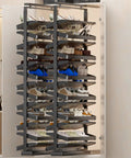 Slick Pull Out Shoe Rack With Heavy Duty Smooth Slide Rails And Adjustable Height Vertical Design in a closet, holding various shoes.