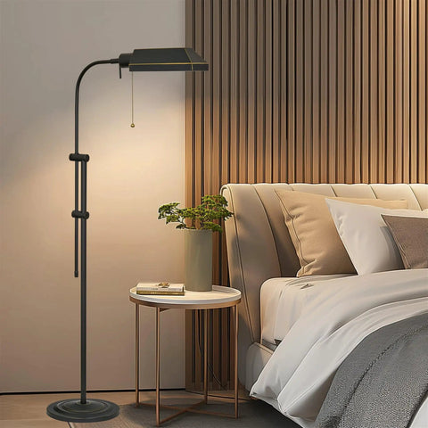 58 Inch Modern Adjustable Pharmacy Floor Lamp In Brushed Nickel With Pull Chain LED 6W Bulb Included beside a bed in a bedroom