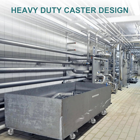 Side view of a gray metal cart with four heavy-duty caster wheels in an industrial facility