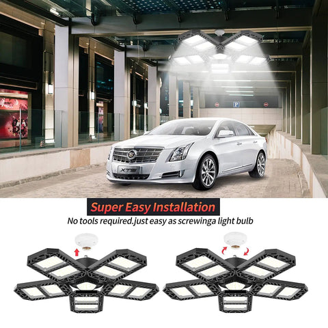 Super Bright 300w Deformable Led Garage Lights With Five Adjustable Panels in a large garage illuminating a parked car