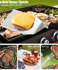 42 Piece Flat Top Griddle Accessories Kit With Extra Wide Burger Spatula and grilling tools on a BBQ teppanyaki griddle