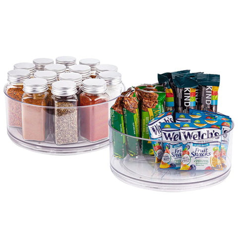 Two Pack Lazy Susan Turntables Clear Acrylic Carousel Storage with spices and snacks organized on clear rotating trays, 360 degrees.