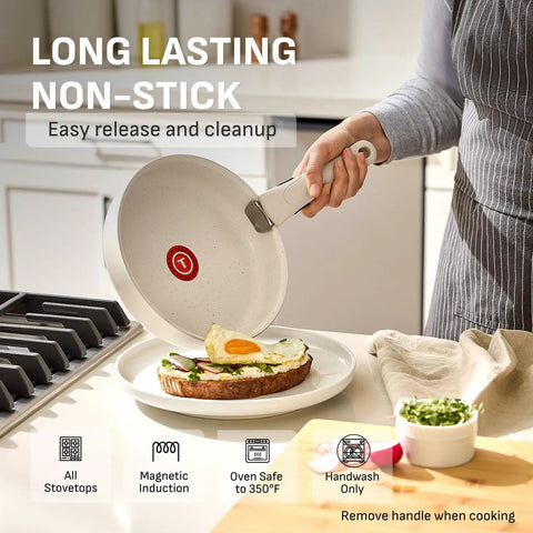 Person using Detachable Handle Cookware Set With Stackable Pots And Pans, Nonstick Granite Titanium, Induction Ready, frying pan