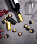 Wine Sealer Kit With Cork Stoppers And PVC Heat Shrink Capsules For Resealing Open Bottles, corks and capsules on table