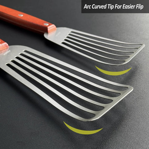 Two stainless steel slotted fish spatulas with wooden handles and curved blades (3x6 in, 4x8 in).