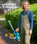 Woman holding Cordless 20V Hedge Trimmer With 20 Inch Dual Action Blades Dual 4.0Ah Batteries Rotatable Handle outdoors