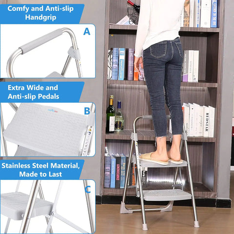 Two Step Stainless Steel Folding Ladder With 500 Pound Capacity Wide Anti Slip Pedals And Beefy Durable Handgrip in use in a library