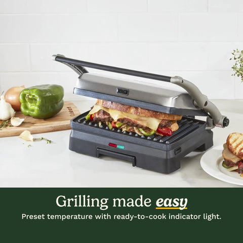 Cuisinart Griddler Indoor Grill And Panini Press With Removable Nonstick Plates grilling a sandwich with melted cheese.