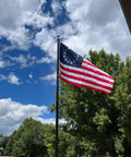 All American Betsy Ross Flag 3x5 Ft Outdoor Embroidered 13 Star Flag Double Sided Colonial Banner waving with trees and sky backdrop