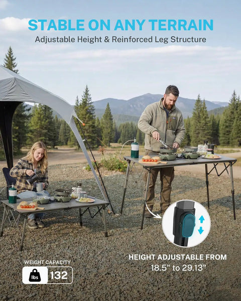 Outdoor scene with a family using a 50 Inch Camping Table With Adjustable Height Legs For Uneven Ground on rocky terrain.