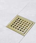 4 Inch Square Shower Drain With Adjustable Base Flange In SUS 304 Stainless Steel Removable Grid Cover Sleek Brushed Gold Finish Scratch Resistant Floor Drain For Bathrooms And Showers Easy Clean Upgrade For Modern Wet Areas