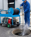 Industrial Heavy Duty Drain Cleaner With 120m Hose For Sewer Cleaning Pipe Cleaning System in use by worker at site